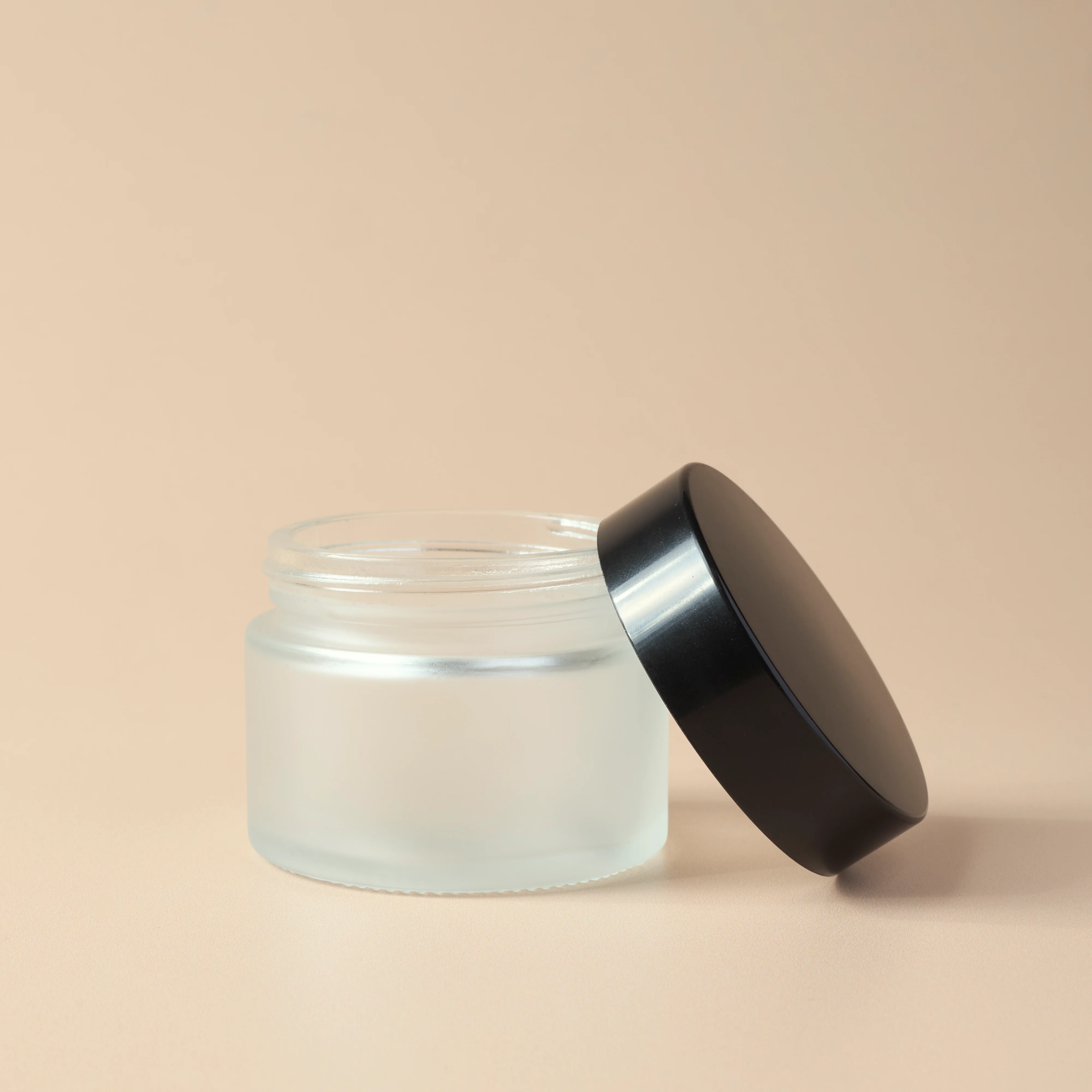 1.69 oz Frosted Glass Jar & Black Lid